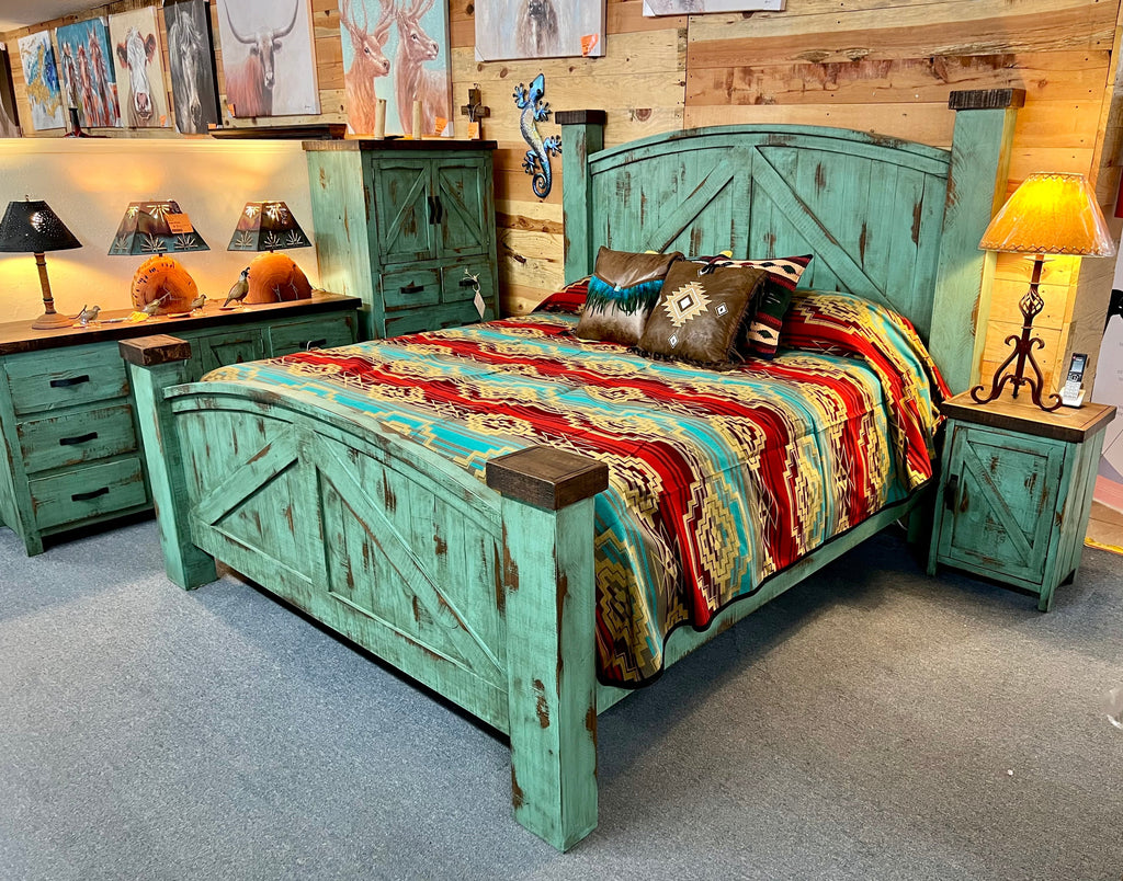 A rustic style bed with a turquoise finish and dark brown accents, featuring a curved headboard and footboard, placed in a room with matching furniture.