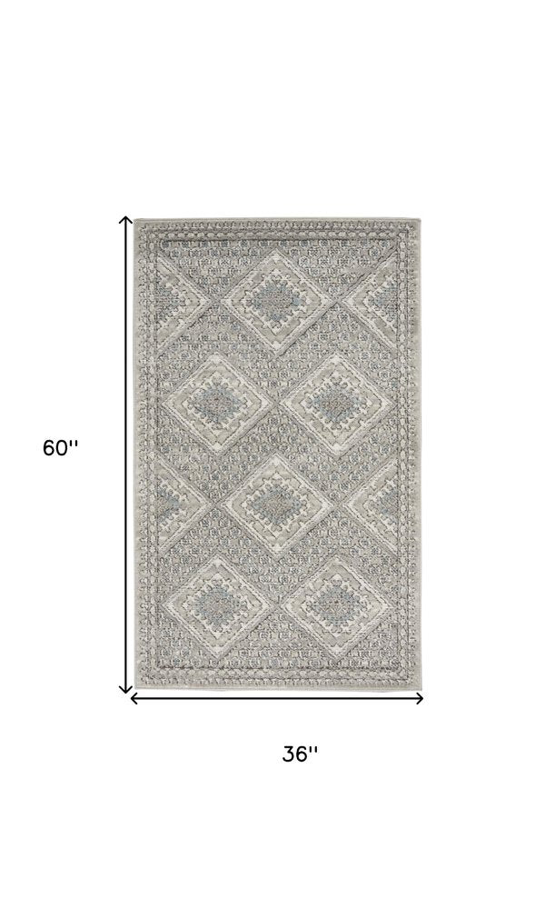 3' X 5' Grey Ivory And Blue Southwestern Power Loom Non Skid Area Rug