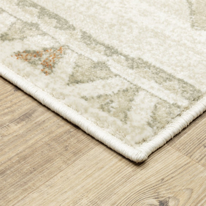 6' X 9' Ivory Orange Tan Black And Grey Southwestern Power Loom Stain Resistant Area Rug