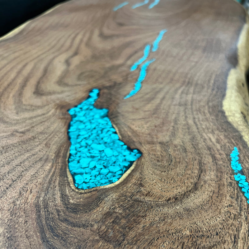 Close-up of a wooden surface with turquoise inlay