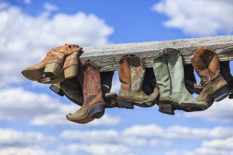Old cowboy boots hanging